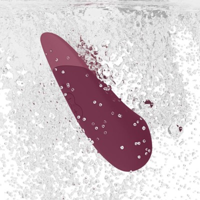 WOMANIZER VIBE VIBRADOR LAY ON SILENCIOSO ROSA OSCURO
