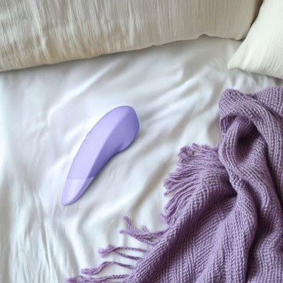 WOMANIZER ENHANCE ESTIMULADOR DE CLITORIS LILA