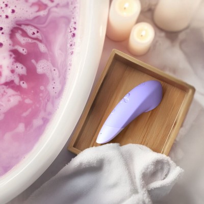 WOMANIZER ENHANCE ESTIMULADOR DE CLITORIS LILA